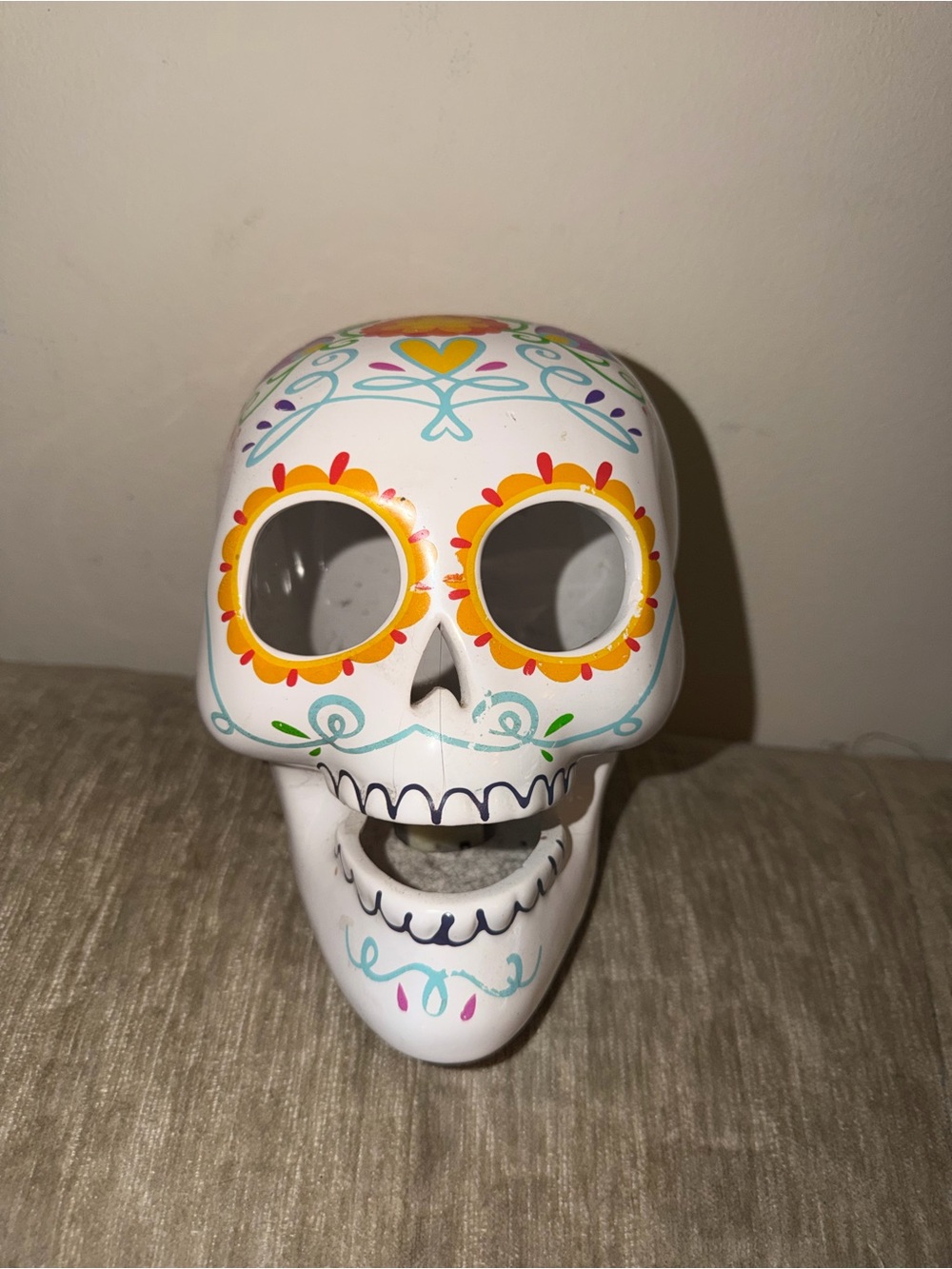 White Decorative Day of the Dead Sugar Skull with Colorful Floral Accents